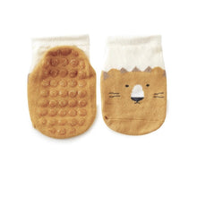 Load image into Gallery viewer, Tot and Toe Baby Grip Sock in Cool and breathable Zoo yellow lion with full panel of grip across the sole, looks like yoga socks, low cut crew cut for warmer weather, great staying on power, gives balance and confidence and mimics barefoot walking benefits for toddlers learning to walk