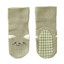 Load image into Gallery viewer, Tot and Toe baby green socks with premium full grip sole, like yoga socks, minimal face and fluffy 3D ears. Fold-able design, made with mostly cotton, comfortable for everyday.