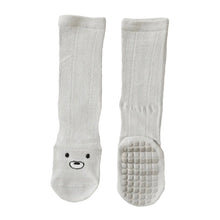 Load image into Gallery viewer, Tot and Toe cool knee high premium baby grip socks in light grey, full sole grip, like yoga socks, plain white with minimal bear face printed on top of foot. Comfortable cool cotton with generous stretch.